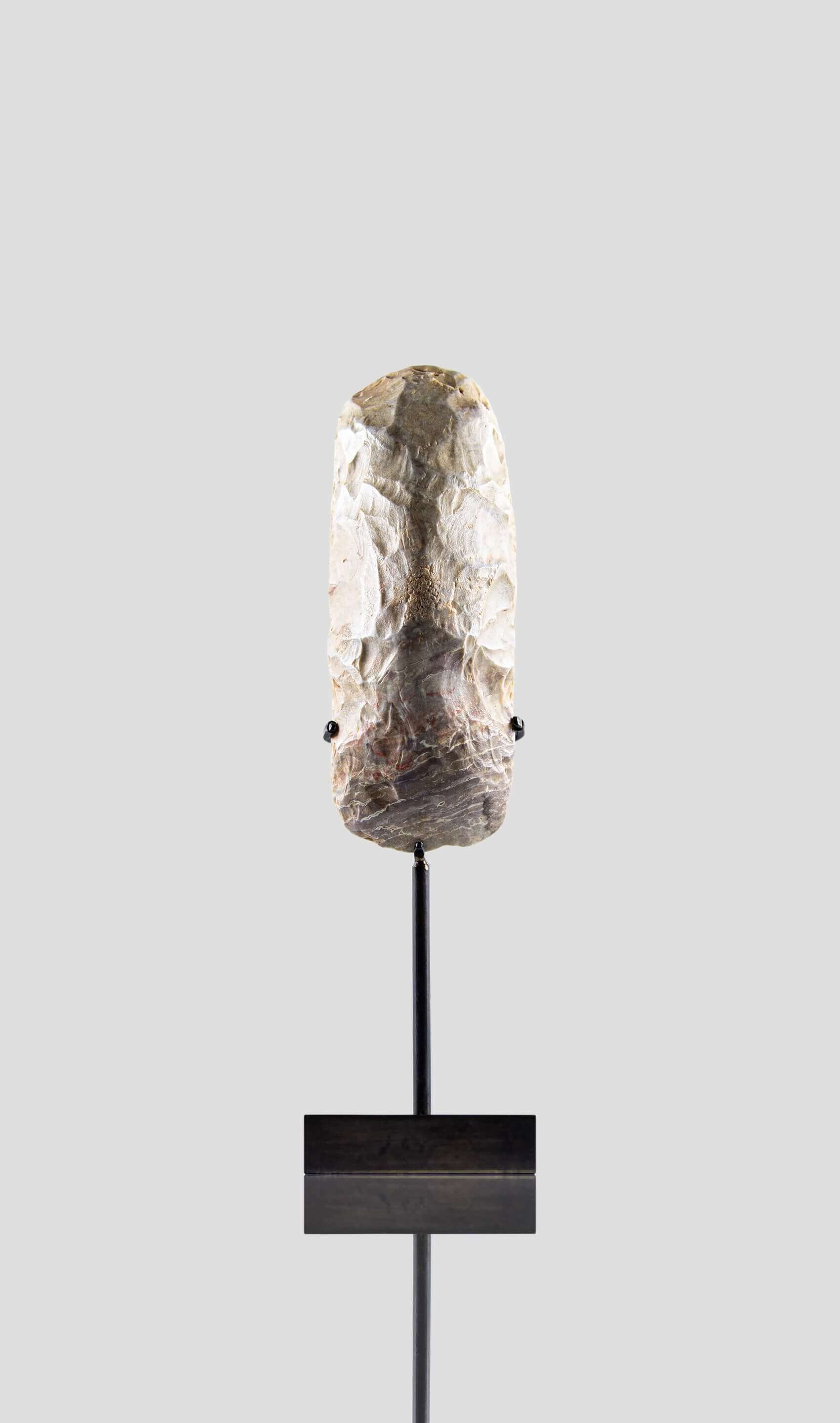 artefact hand axe for sale on bronze stand 2