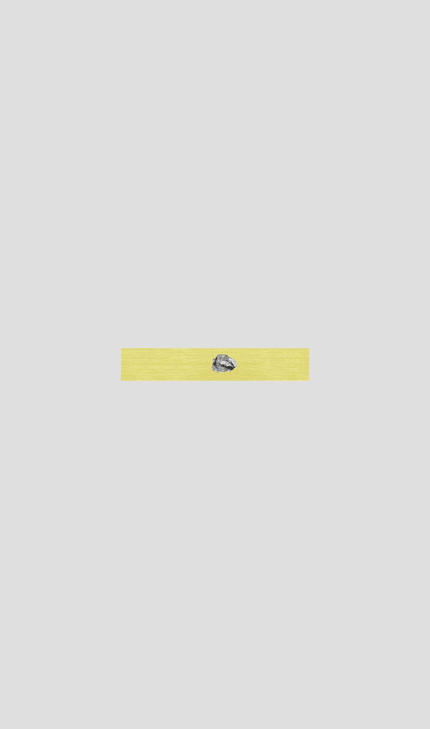 Campo Del Cielo meteorite fragment on a yellow aluminium base, representing a timeless cosmic gift.