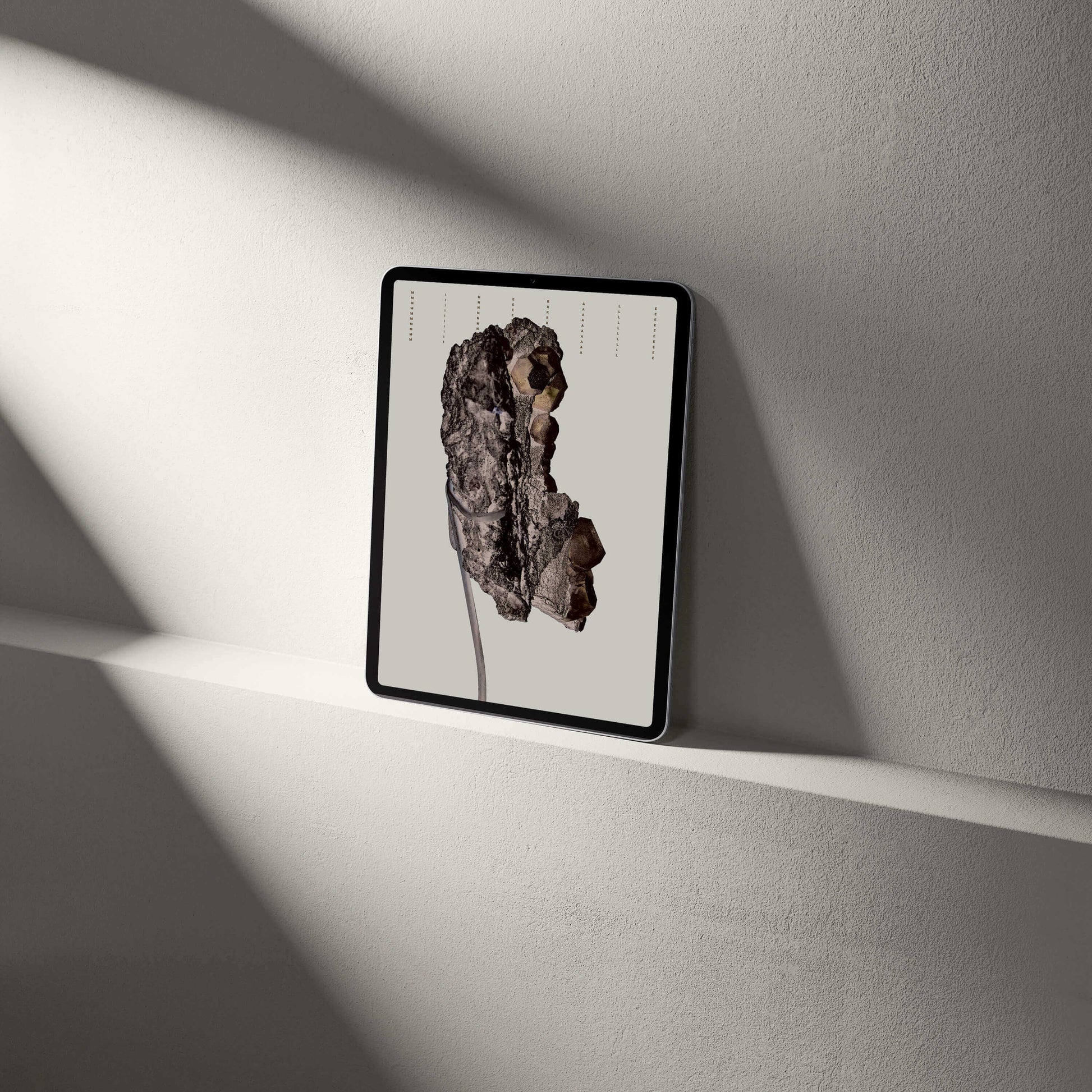 Fluorite crystal tablet wallpaper displayed on a sleek tablet against a minimalist wall.