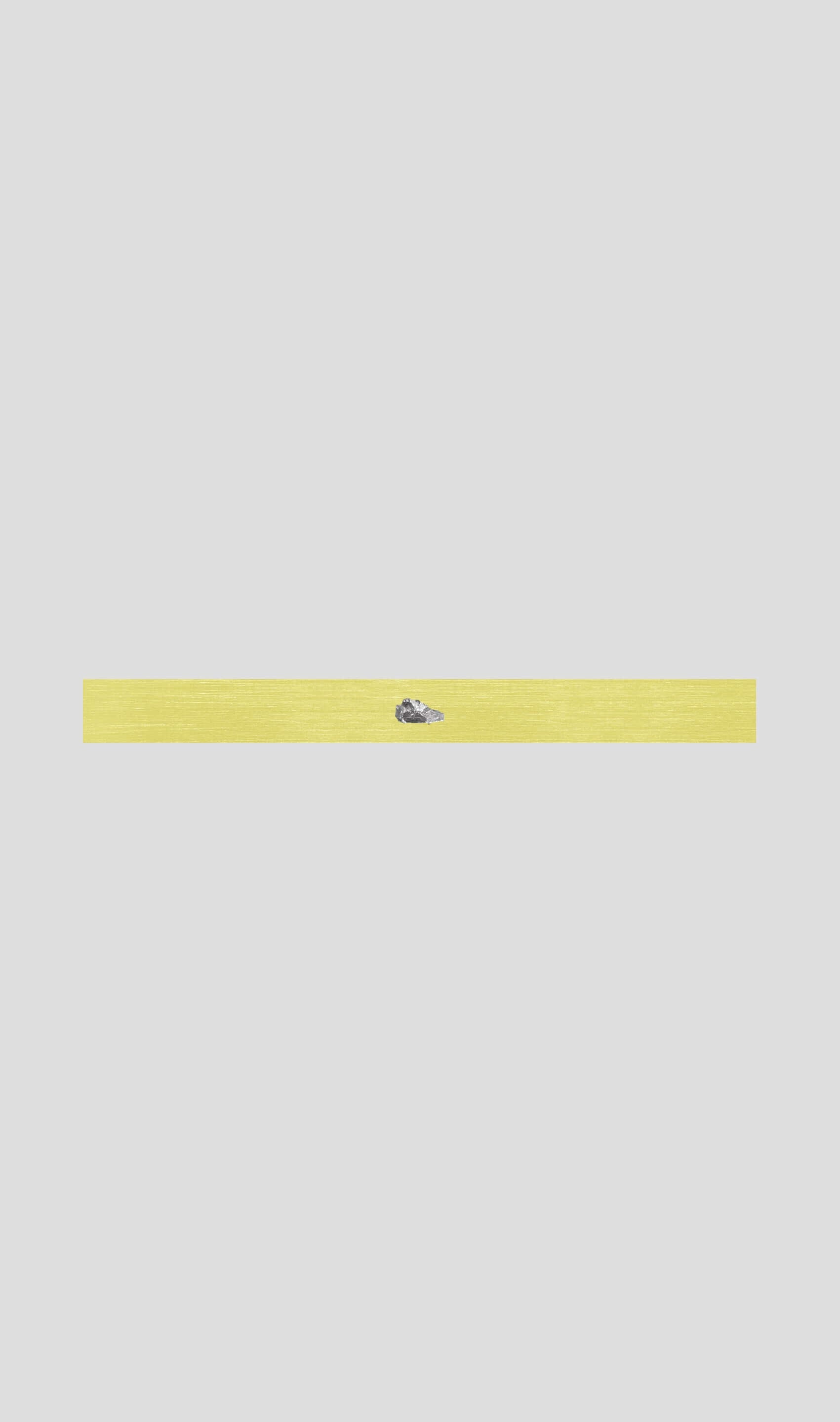 Streamlined yellow bracelet featuring a delicate design with a small blue accent, showcasing minimalistic elegance.