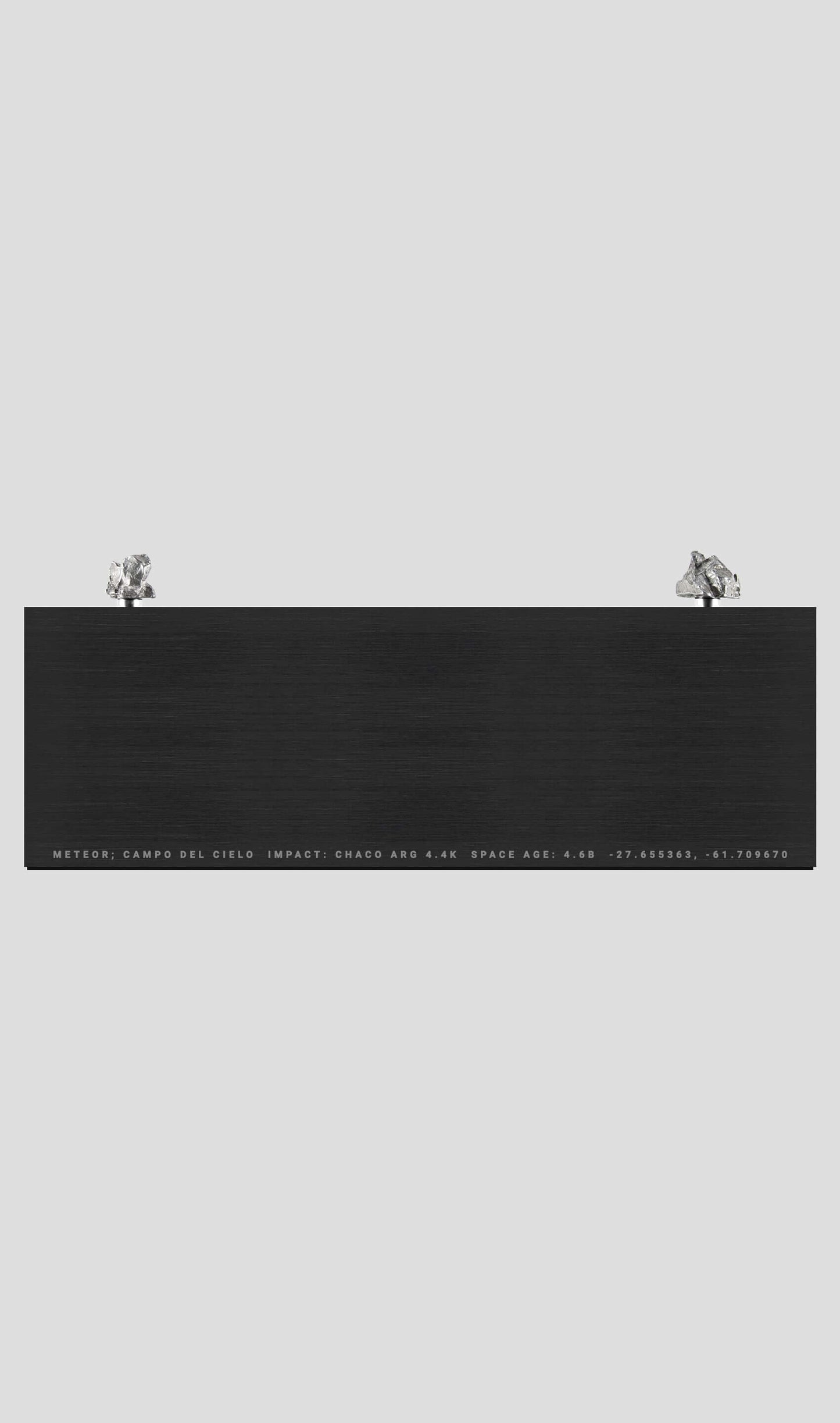 Campo Del Cielo meteorite on aluminium base, showcasing its cosmic beauty and timeless appeal.