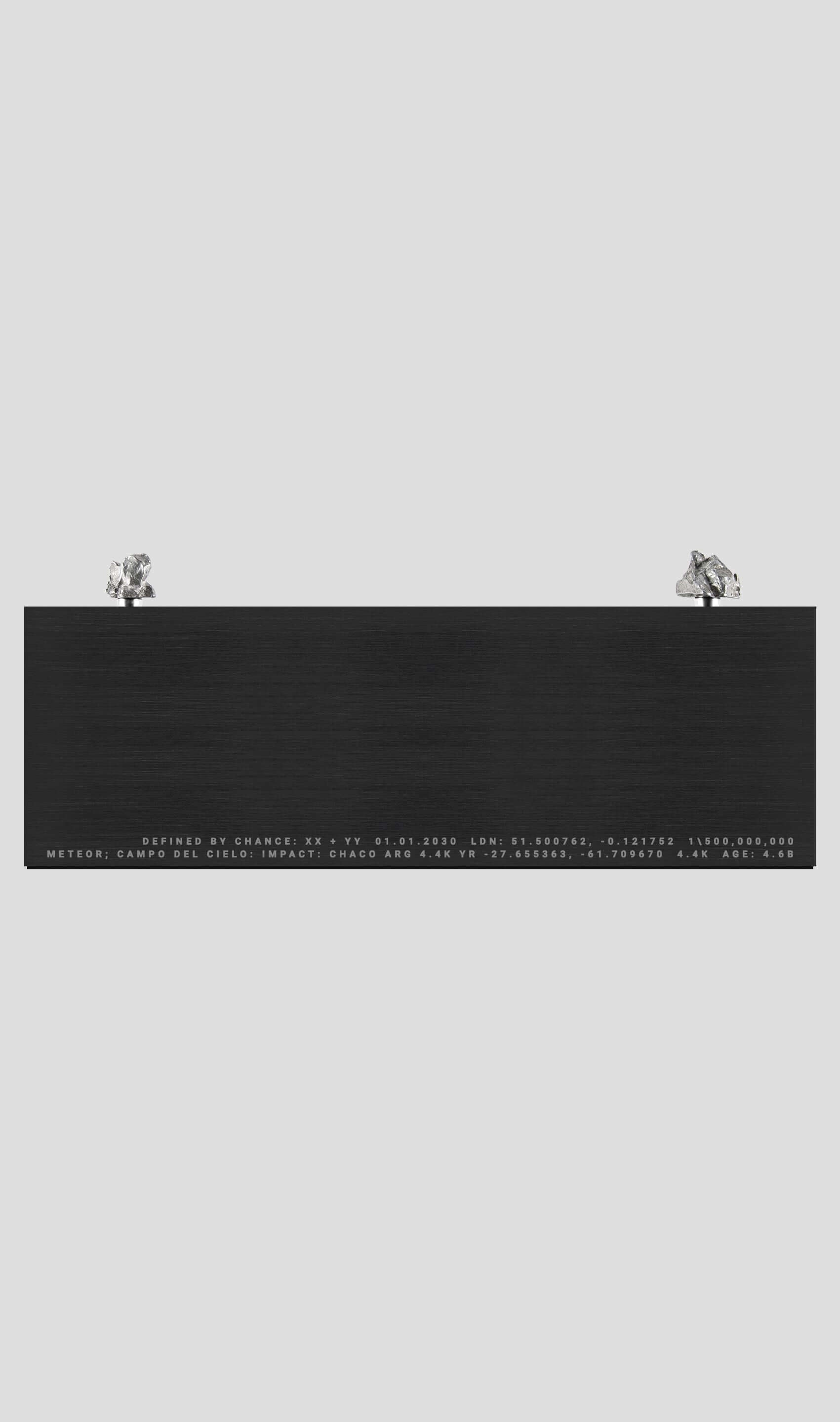 Campo Del Cielo meteorite displayed on a VOSSO aluminium base, showcasing its cosmic beauty and timeless appeal.