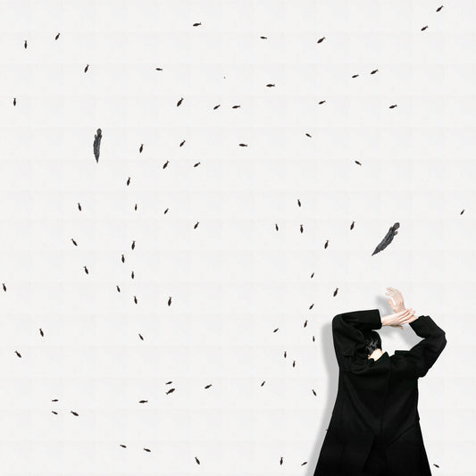 Artistic depiction of a figure interacting with scattered abstract shapes on a light background.