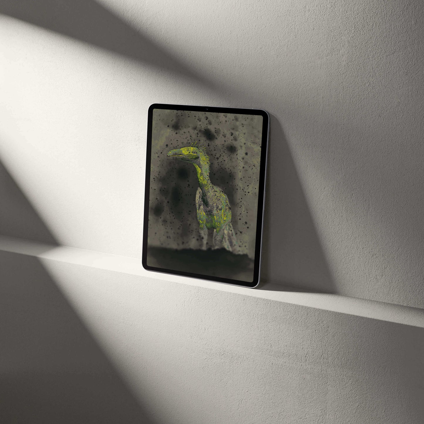 Stylish tablet displaying a VOSSO® digital Raptor wallpaper, blending palaeontological art and modern design.
