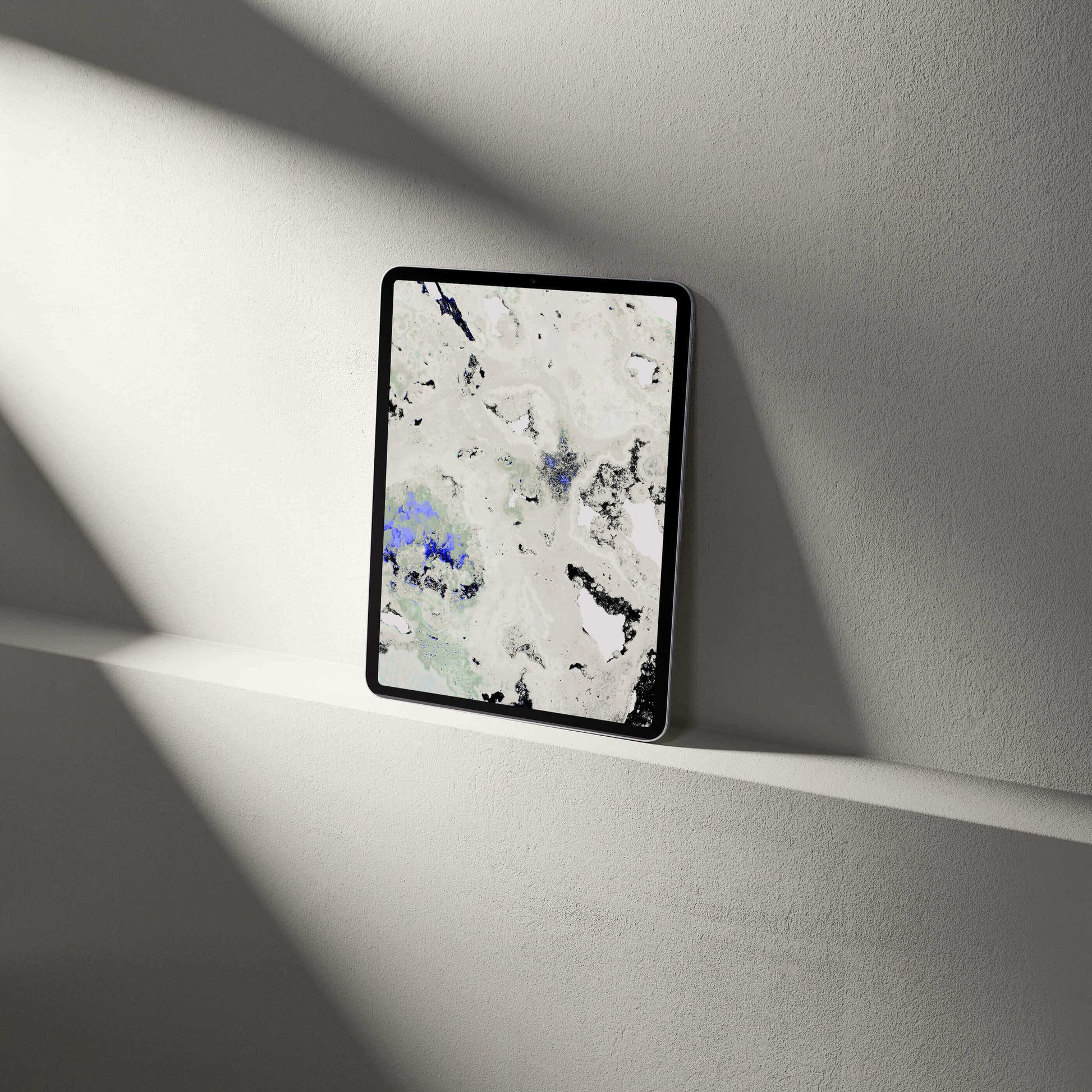 Digital Amethyst Crystal Tablet Wallpaper displayed on a shelf, showcasing mineralogical textures and vibrant colors.