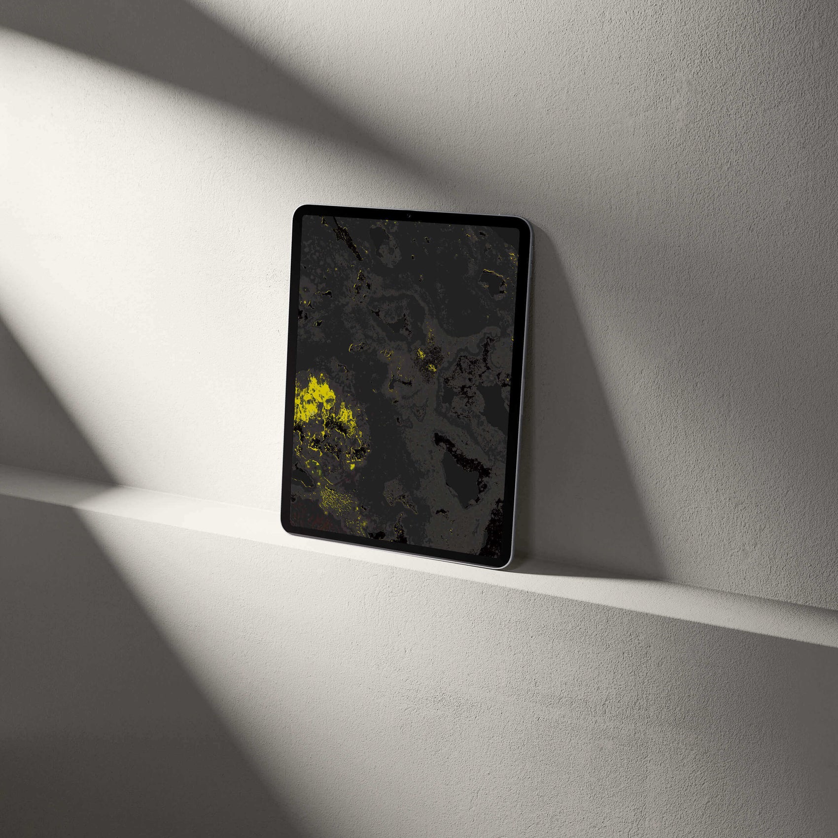 Digital amethyst crystal tablet wallpaper showcasing vibrant mineral textures and colors on a sleek tablet.