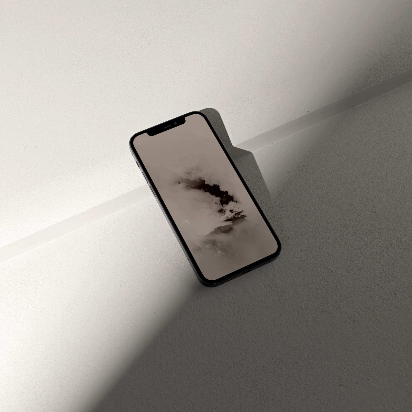 Stylish phone displaying a minimalist digital pterosaur storm wallpaper designed by VOSSO®.
