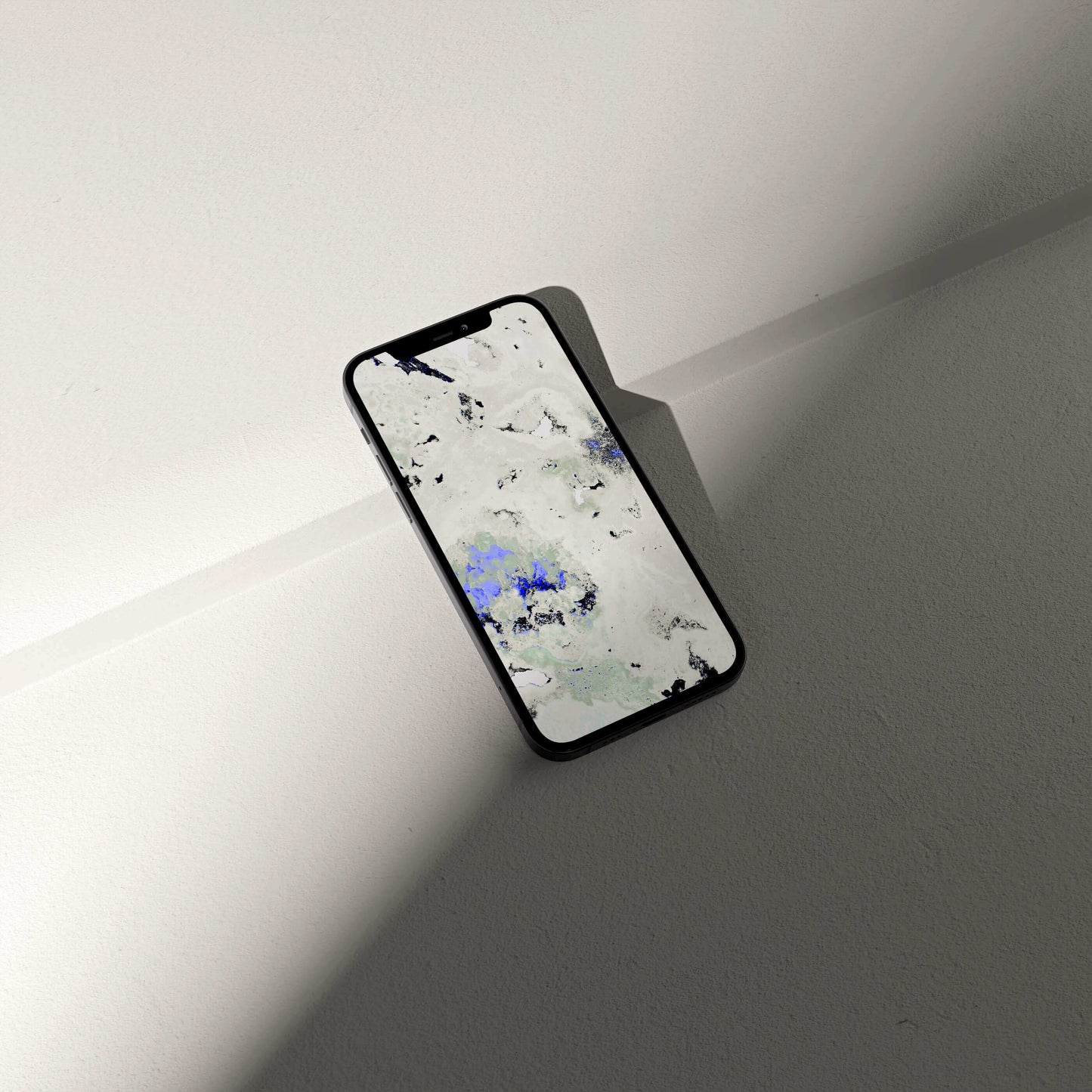 Digital amethyst crystal phone wallpaper displayed on a modern smartphone, showcasing stunning mineral-inspired visuals.