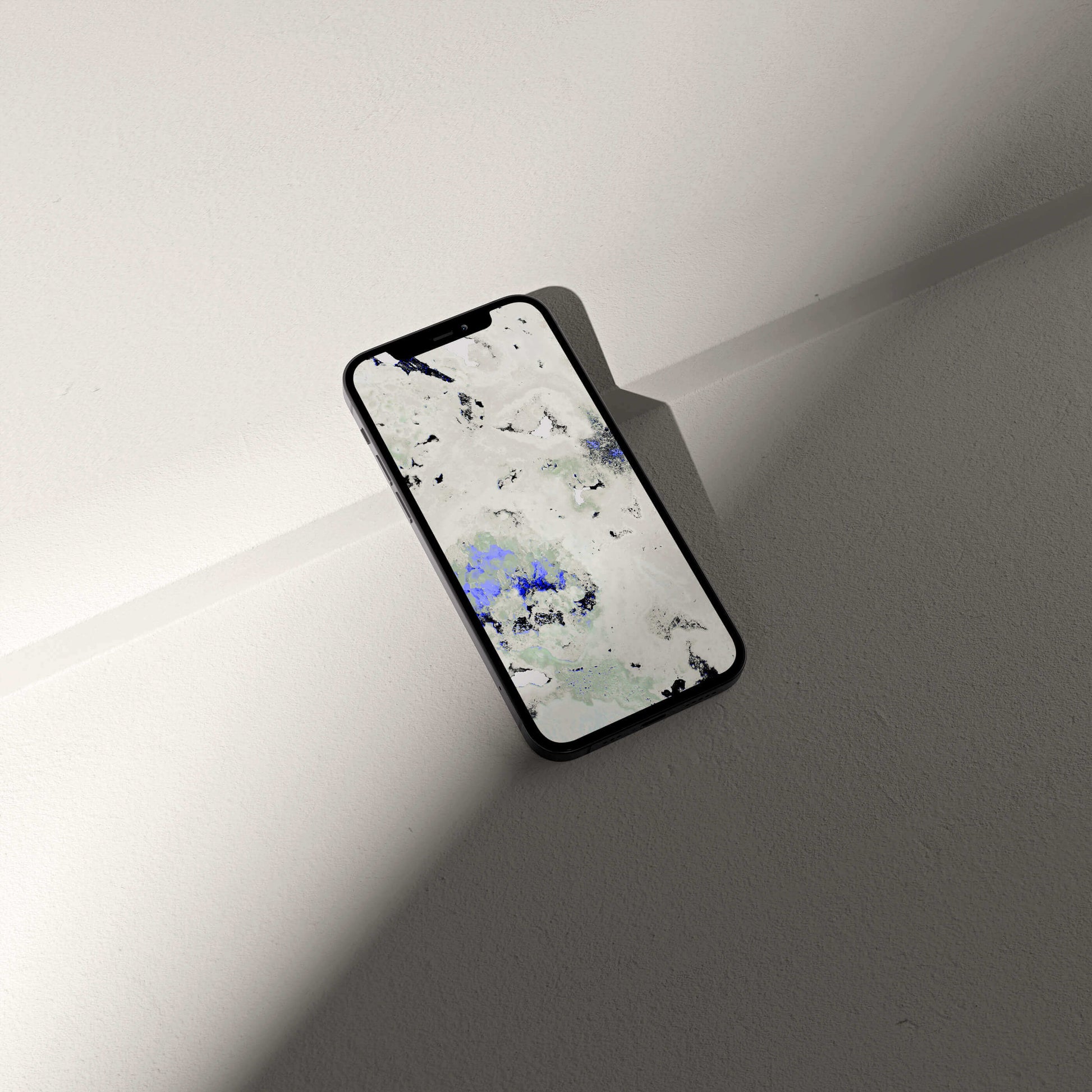 Digital amethyst crystal phone wallpaper displayed on a modern smartphone, showcasing stunning mineral-inspired visuals.