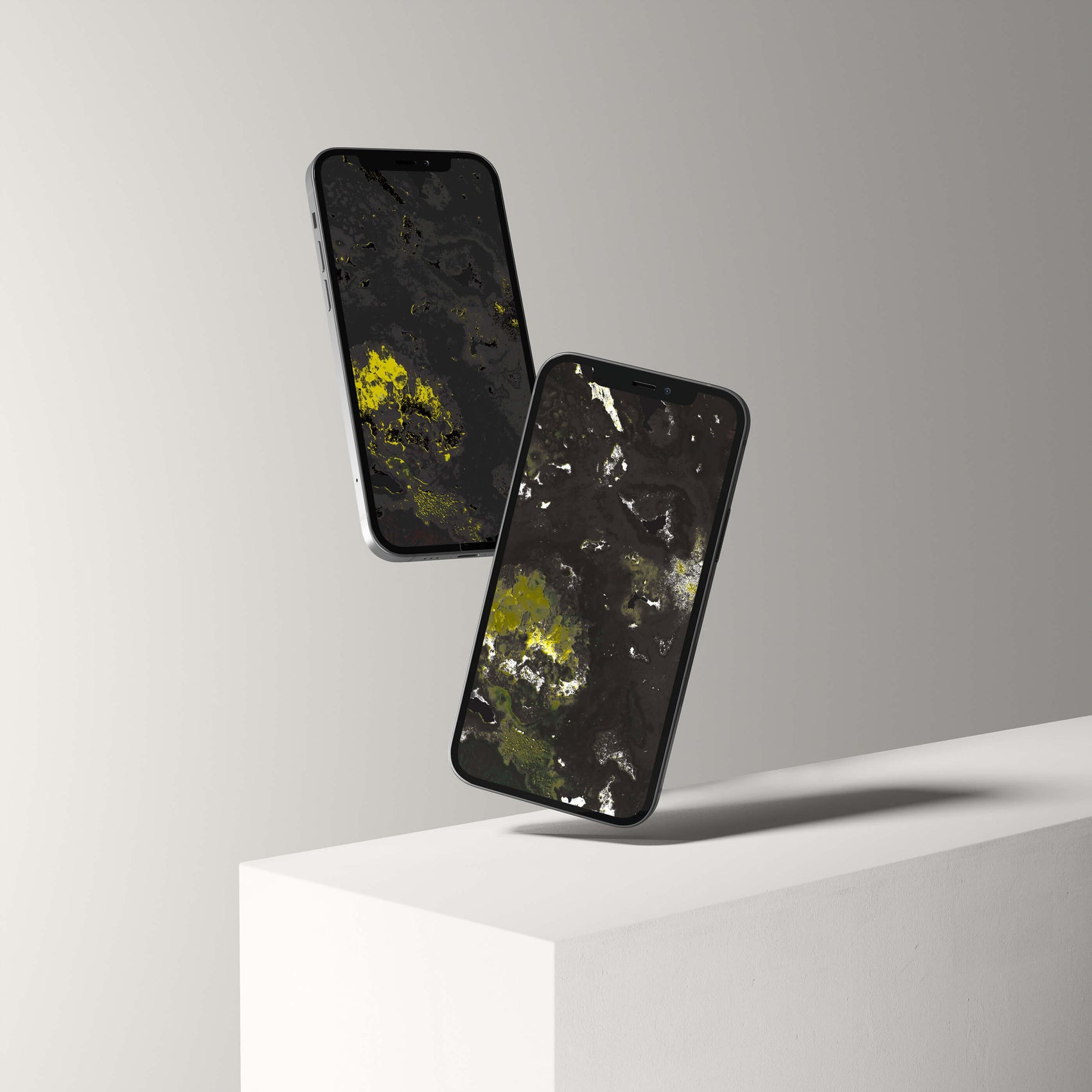 Two smartphones displaying digital amethyst crystal wallpapers, showcasing stunning mineral-inspired designs.
