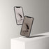 Stylish phone displaying a minimalist digital pterosaur storm wallpaper.