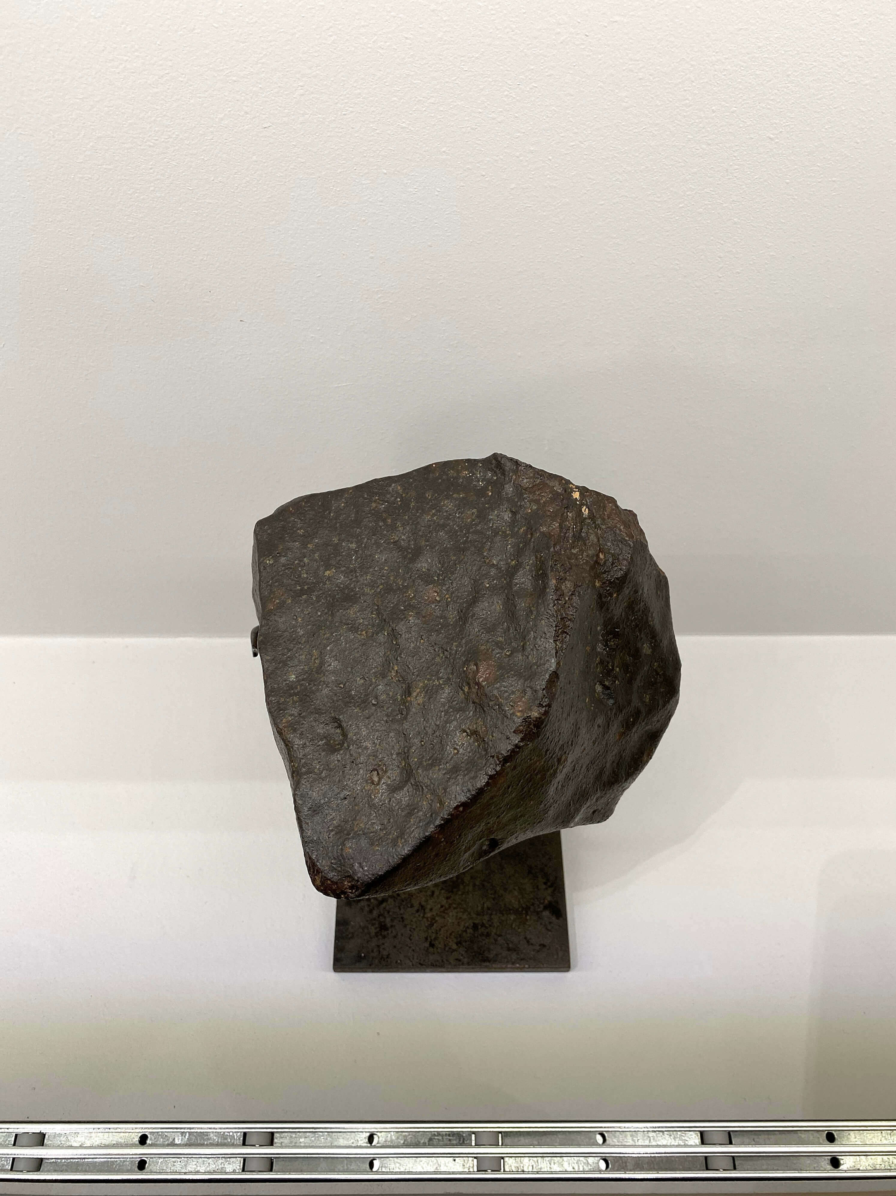 rare h5 nwa meteorite for sale on bronze stand at the uk meteorite shop 49