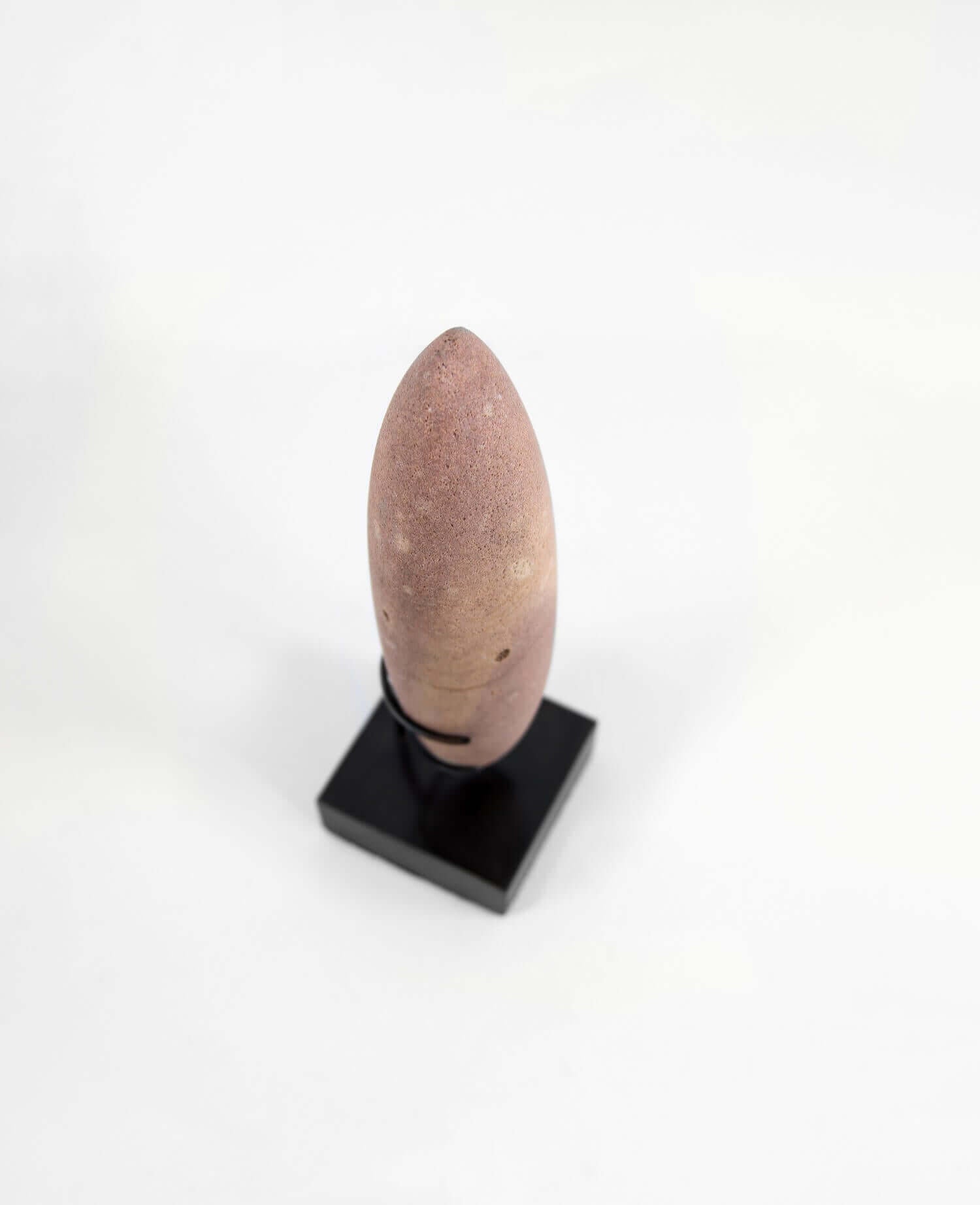 A stunning museum-standard rare authentic Neolithic pestle measuring 247mm created by an ancient hand