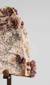 Beautiful red Vanadanite mineral gems in pink stone on a custom designed bronze Stand measuring 206mm