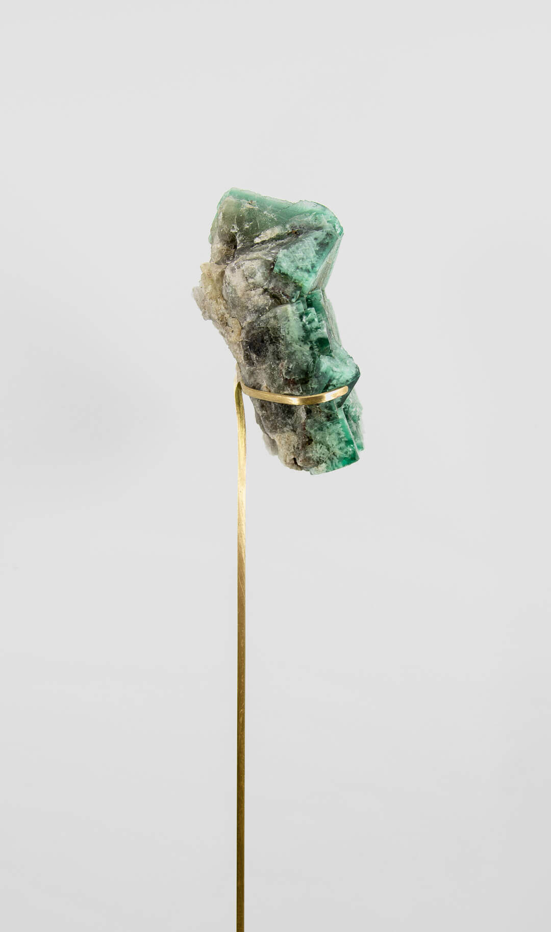 stunning green British fluorite for sale on the fossil store custom brass stand 05